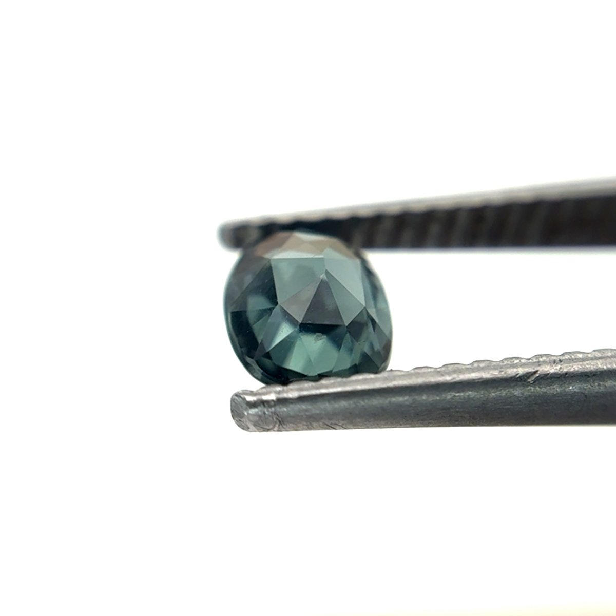0.64 carat Greenish Blue Spinel, 6x4.8mm Oval cut