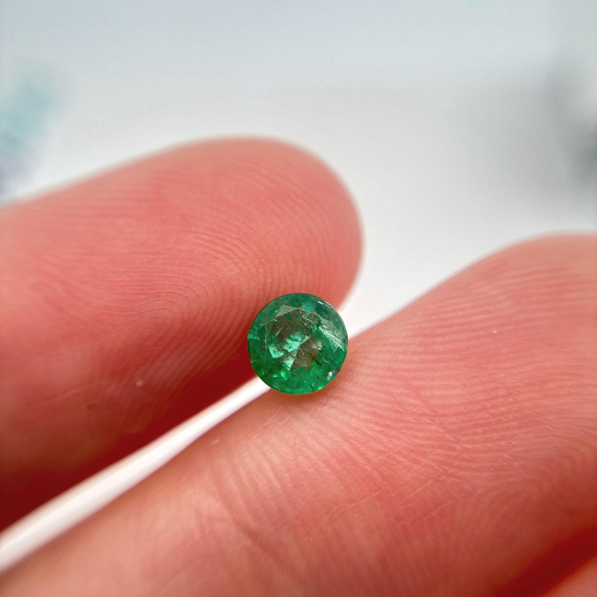 5.4mm Round Cut Green Emerald, 0.63 carat Natural Gem